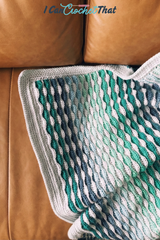 The Beckett Textured Crochet Blanket Pattern with Self-Striping Yarn