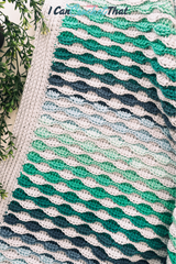 The Beckett Textured Crochet Blanket Pattern with Self-Striping Yarn